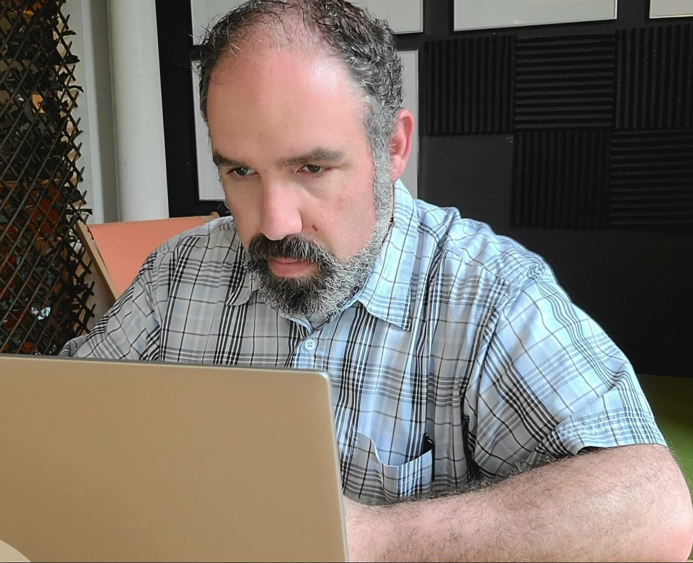 seth-at-computer-not-cropped-scaled.jpeg