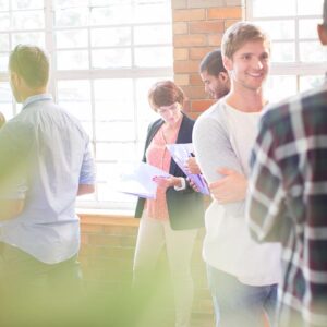 People networking at community center