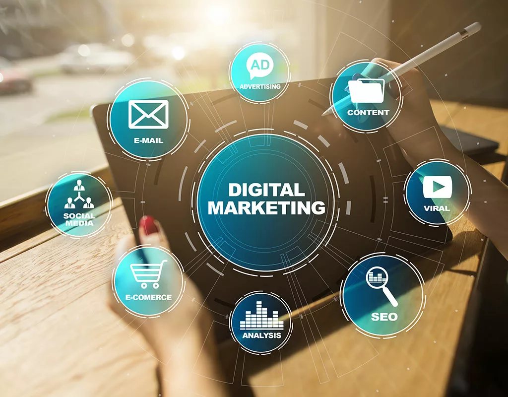 Digital marketing graphic showing a person holding a tablet. Floating in front is all the different aspects of digital marketing in a Minority report-esq view