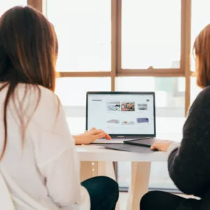 two women working together on digital marketing coaching and consulting