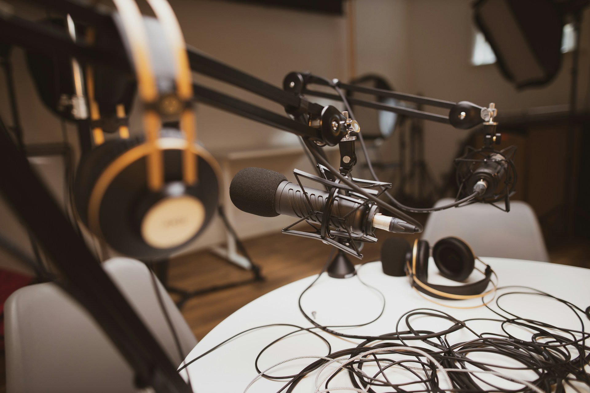 Podcast studio. With microphone and headphones and wires